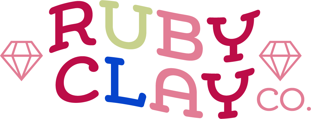 Official Ruby Clay Co. logo: multicolored RUBY CLAY CO. lettering between two pink diamond outlines (first-party).