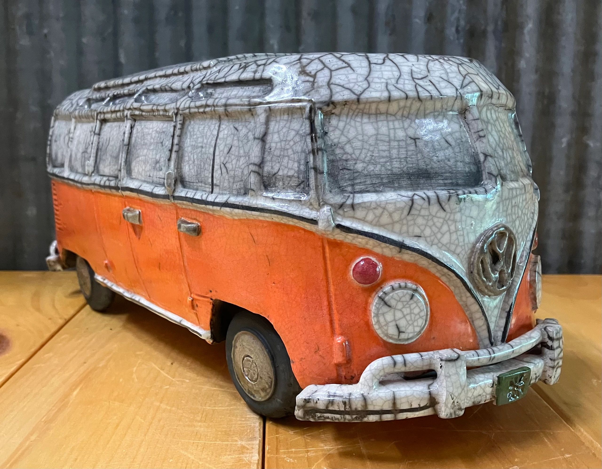 Raku-fired crackle VW bus sculpture from the Vermont Clay Guild website. First-party photo.
